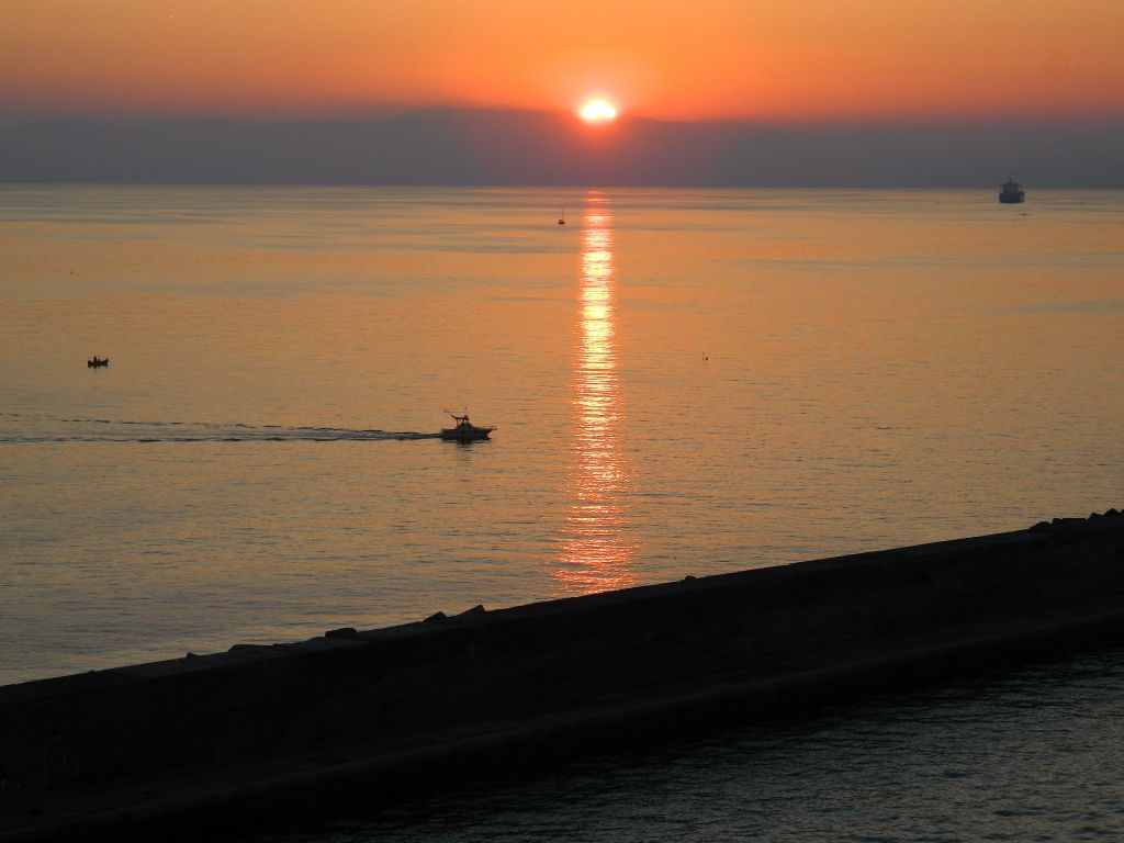 Il saluto del sole a Genova
